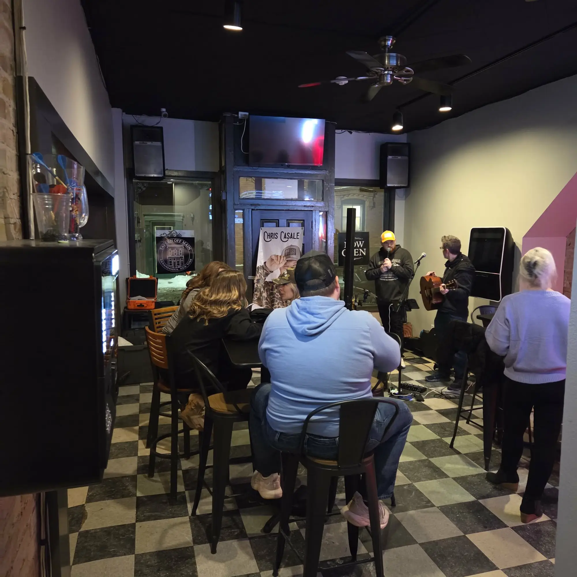 Acoustic duo performing at Tavern Off Main